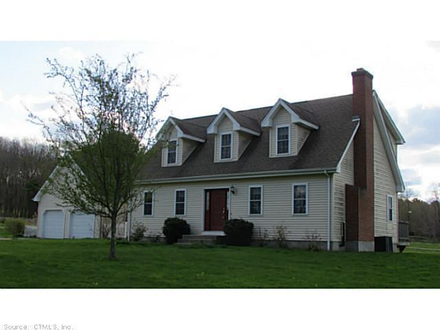 27 Valinsky Road Lebanon, CT 06249 - Photo 1 of 1 a front view of a house with a yard