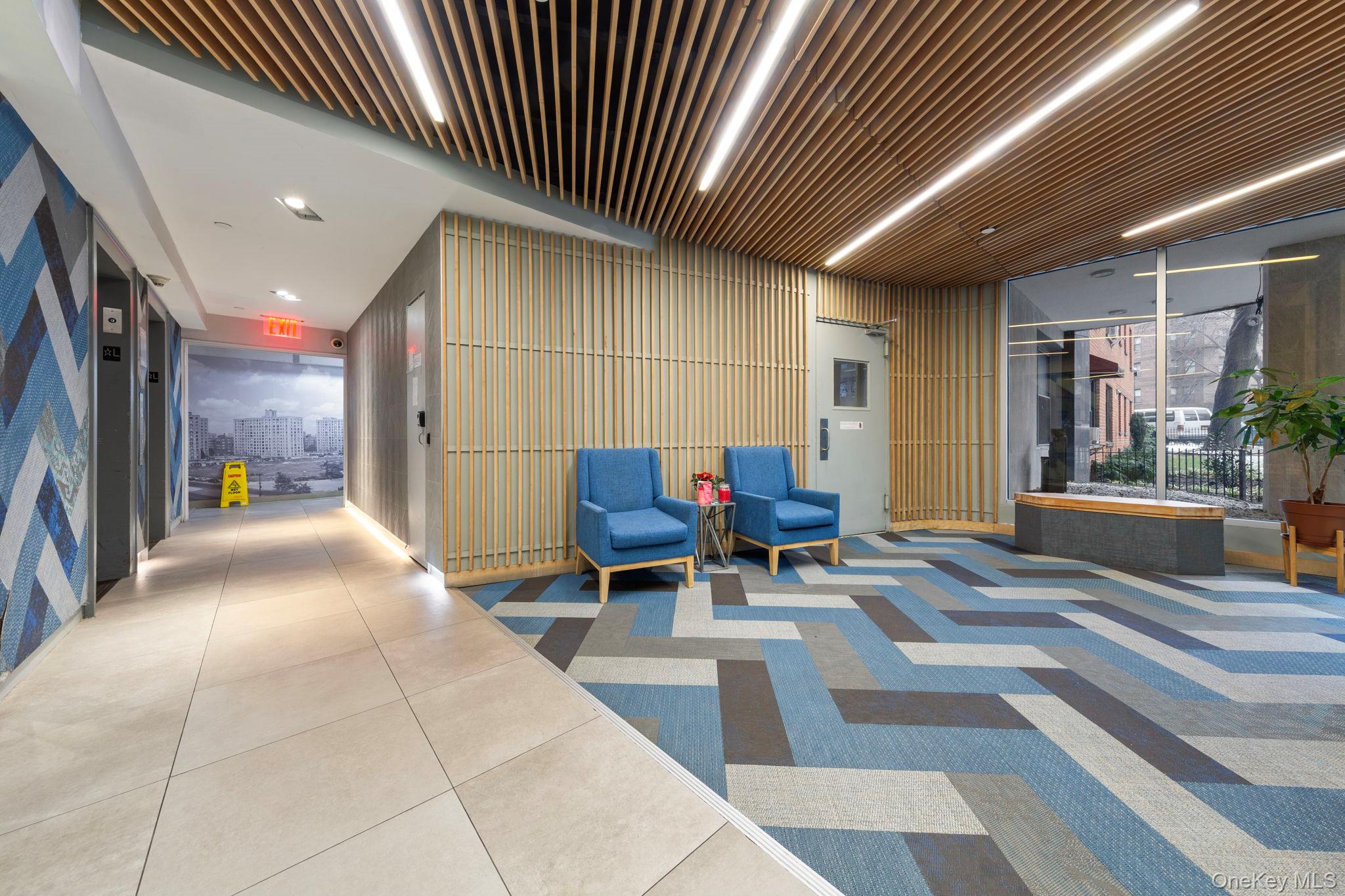 99-72 66th Road, Unit 1Z Queens, NY 11374 - Photo 14 of 16 a lobby with furniture and window