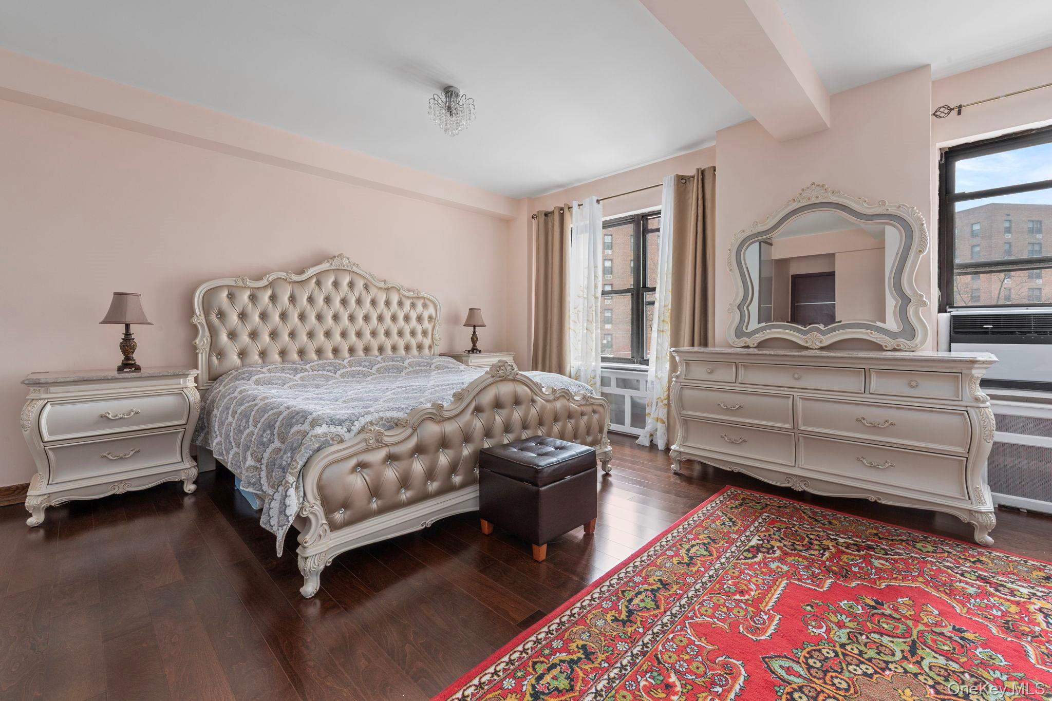 99-72 66th Road, Unit 1Z Queens, NY 11374 - Photo 8 of 16 a bedroom with a bed and a dresser