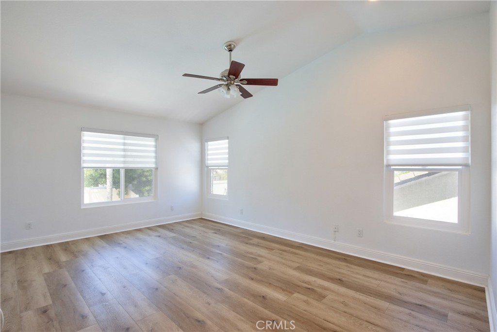 23126 Teil Glen Road Wildomar, CA 92595 - Photo 18 of 48 wooden floor in an empty room with a window