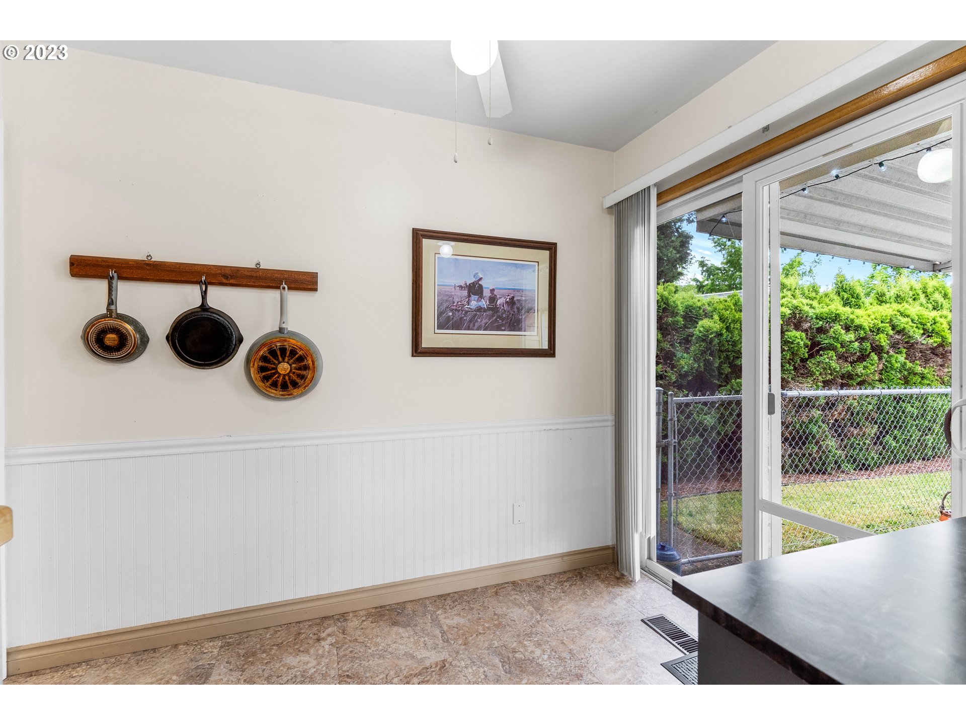 943 Oregon Way Woodburn, OR 97071 - Photo 13 of 39 a view of an empty room with a window