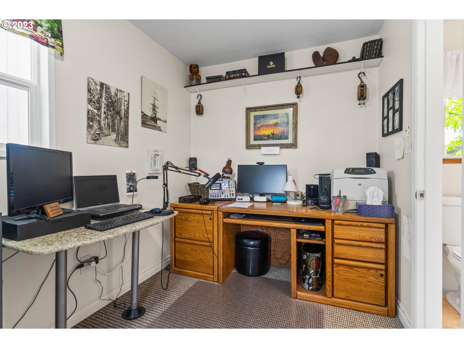 943 Oregon Way Woodburn, OR 97071 - Photo 26 of 39 a kitchen with stainless steel appliances a stove a sink and a refrigerator