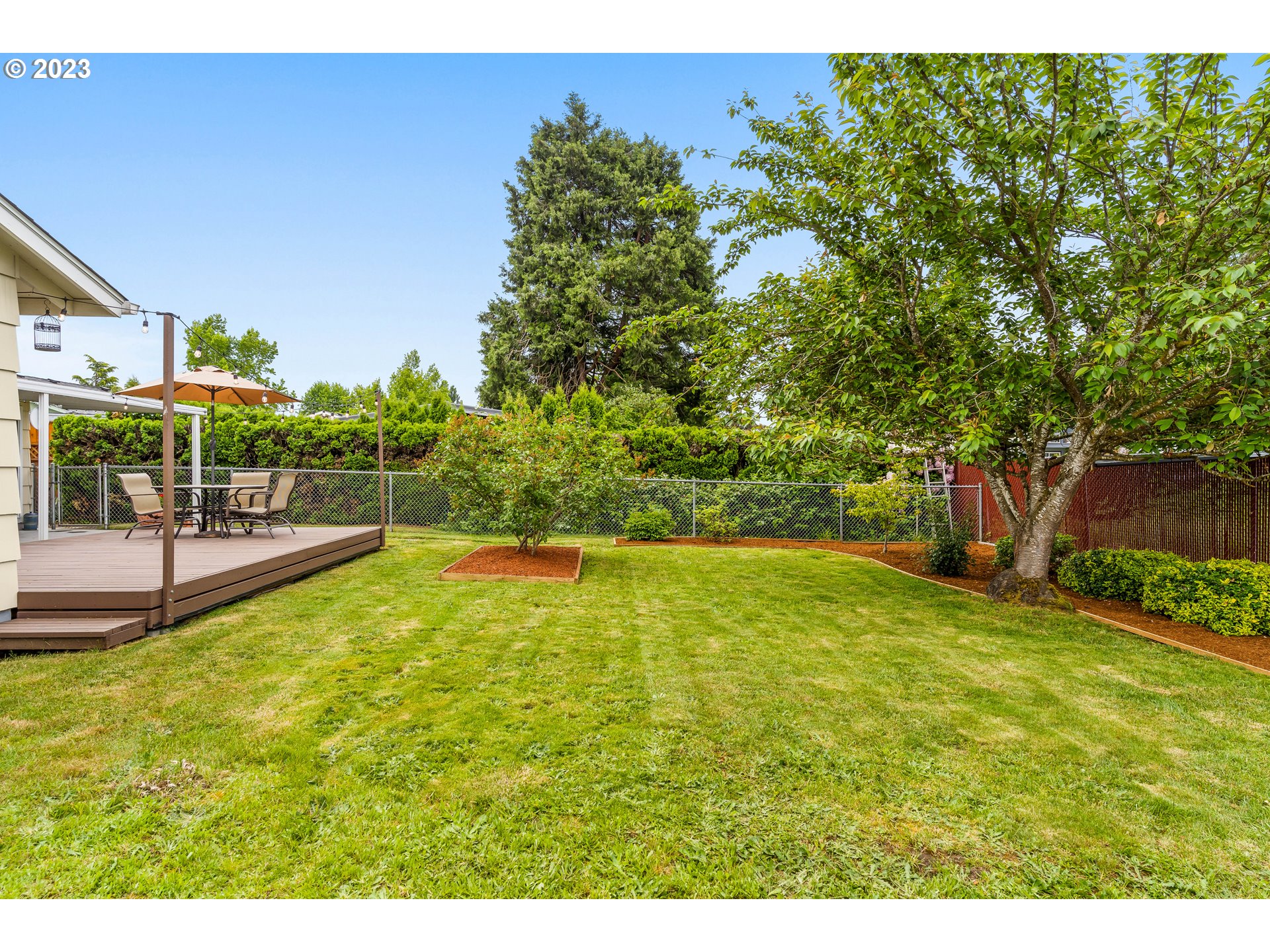 943 Oregon Way Woodburn, OR 97071 - Photo 31 of 39 a view of a swimming pool with a patio