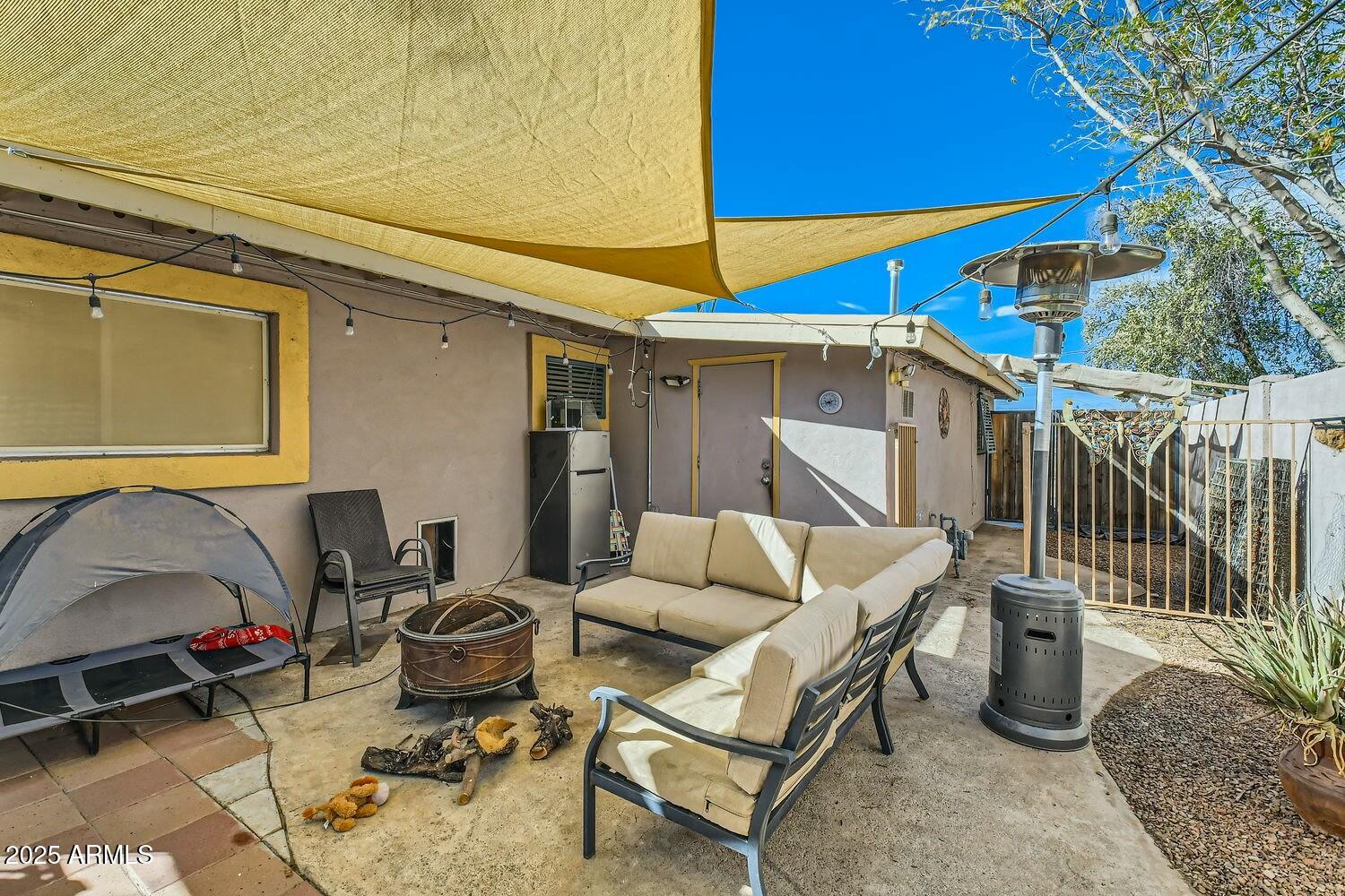 9031 North 14th Street Phoenix, AZ 85020 - Photo 21 of 33 a balcony with furniture and a potted plant