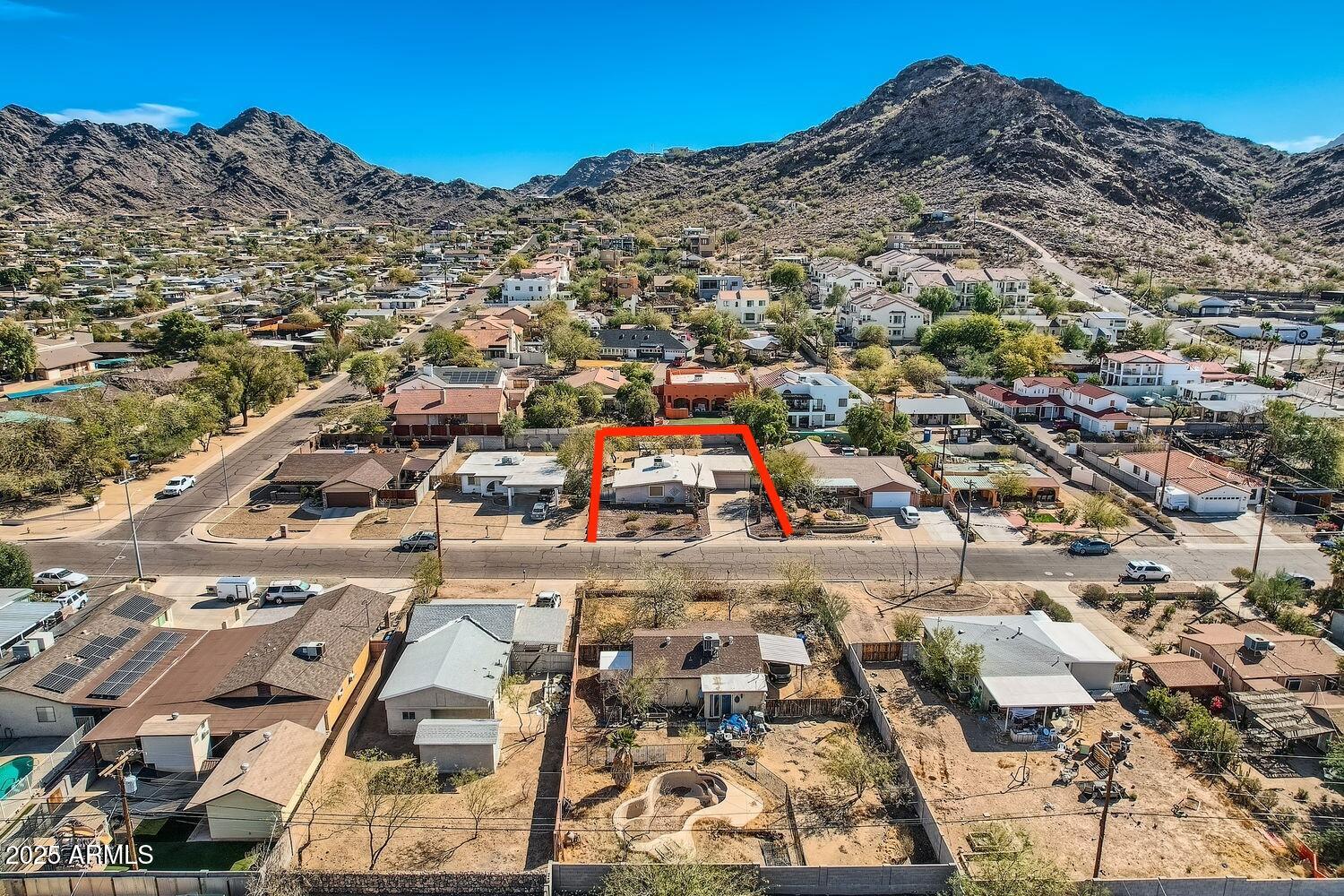 9031 North 14th Street Phoenix, AZ 85020 - Photo 29 of 33 an aerial view of residential houses with outdoor space
