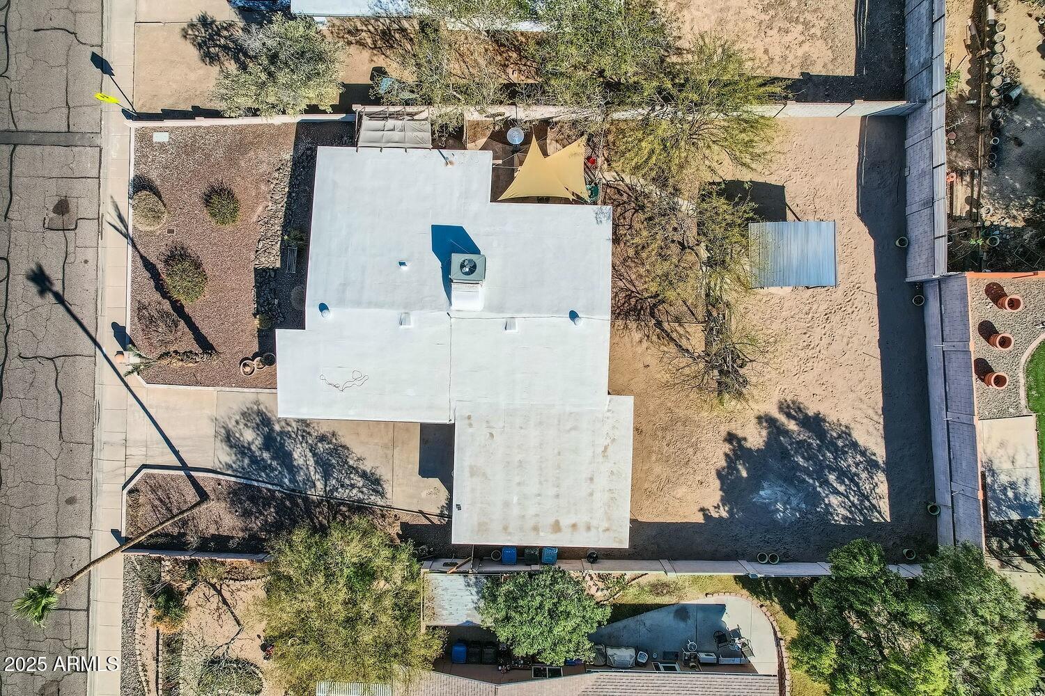 9031 North 14th Street Phoenix, AZ 85020 - Photo 31 of 33 aerial view of a house with a yard and large trees