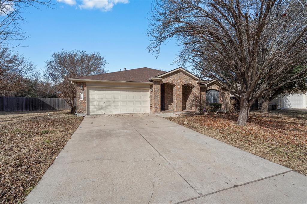 1308 Pigeon View Street Round Rock, TX 78665 - Photo 1 of 1 a front view of a house with a yard and garage
