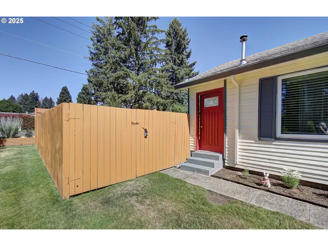 a backyard of a house with lots of green space