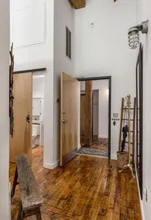 a view of a livingroom with wooden floor