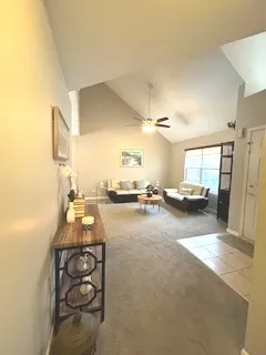 a view of a living room and dining room