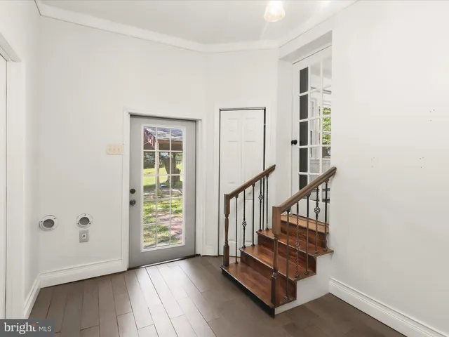 a view of a hallway with entryway
