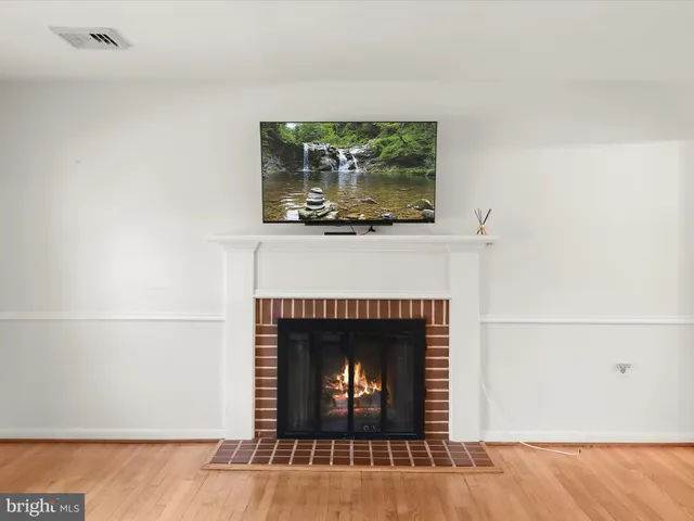 a living room with a fireplace