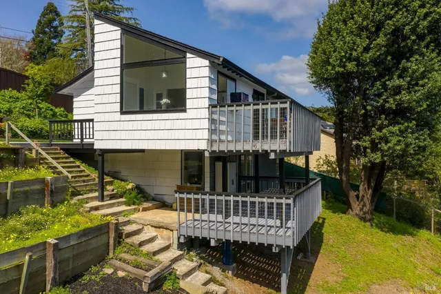 a dining room with a window and a table