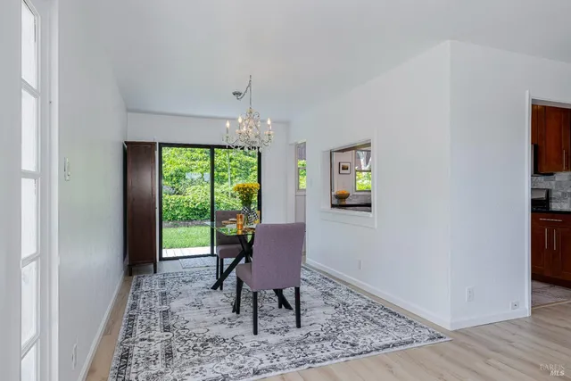 a view of dining room with wooden floor