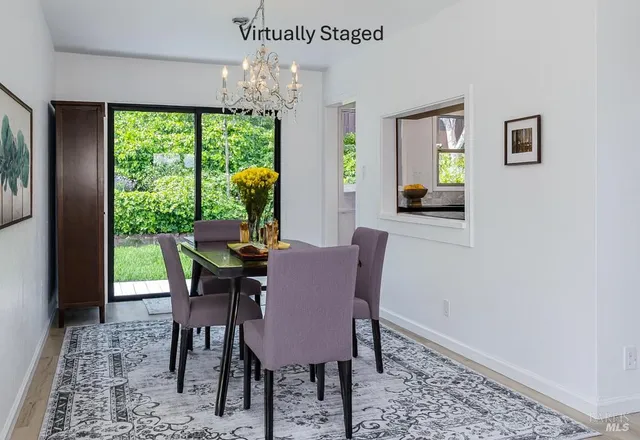 a kitchen with stainless steel appliances granite countertop wooden cabinets a stove top oven a sink and dishwasher