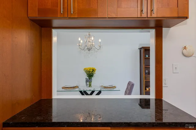 a utility room with cabinets and furniture