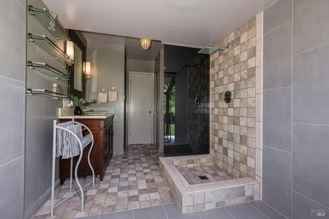 a view of a balcony with wooden floor