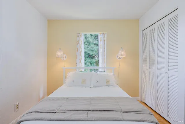 an aerial view of a house with a swimming pool outdoor seating and yard