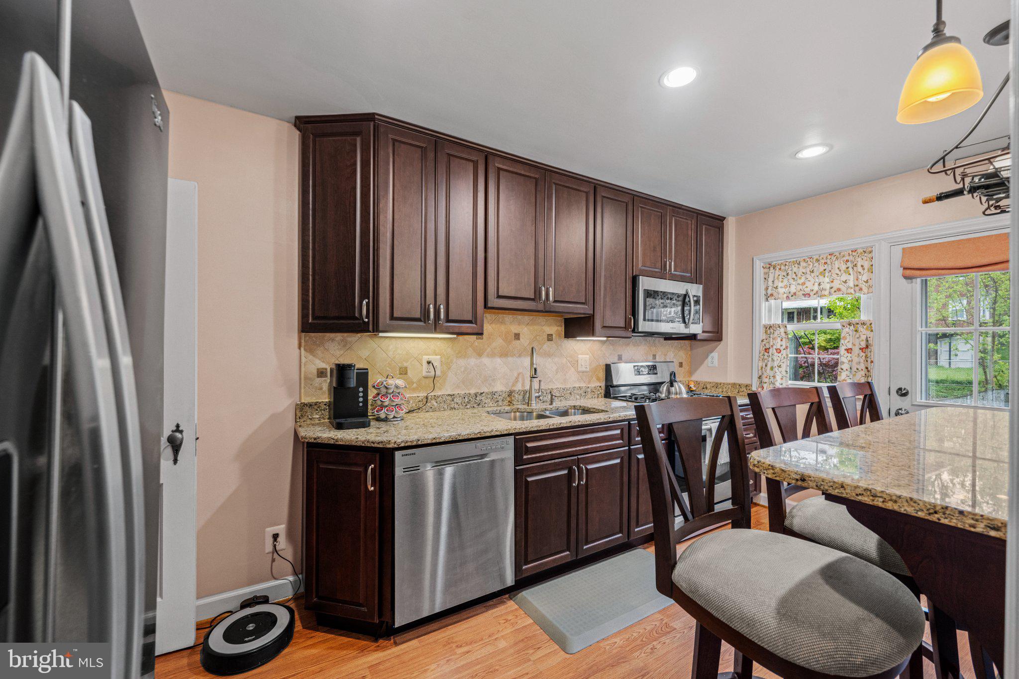 406 Greenlow Road Baltimore, MD 21228 - Photo 13 of 31 Modern kitchen with elegant finishes.