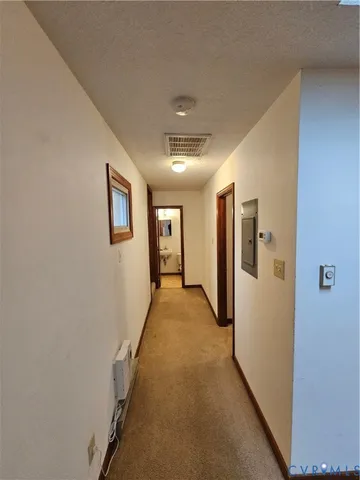 a view of hallway with stairs