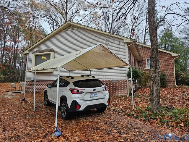 a house view with a backyard space