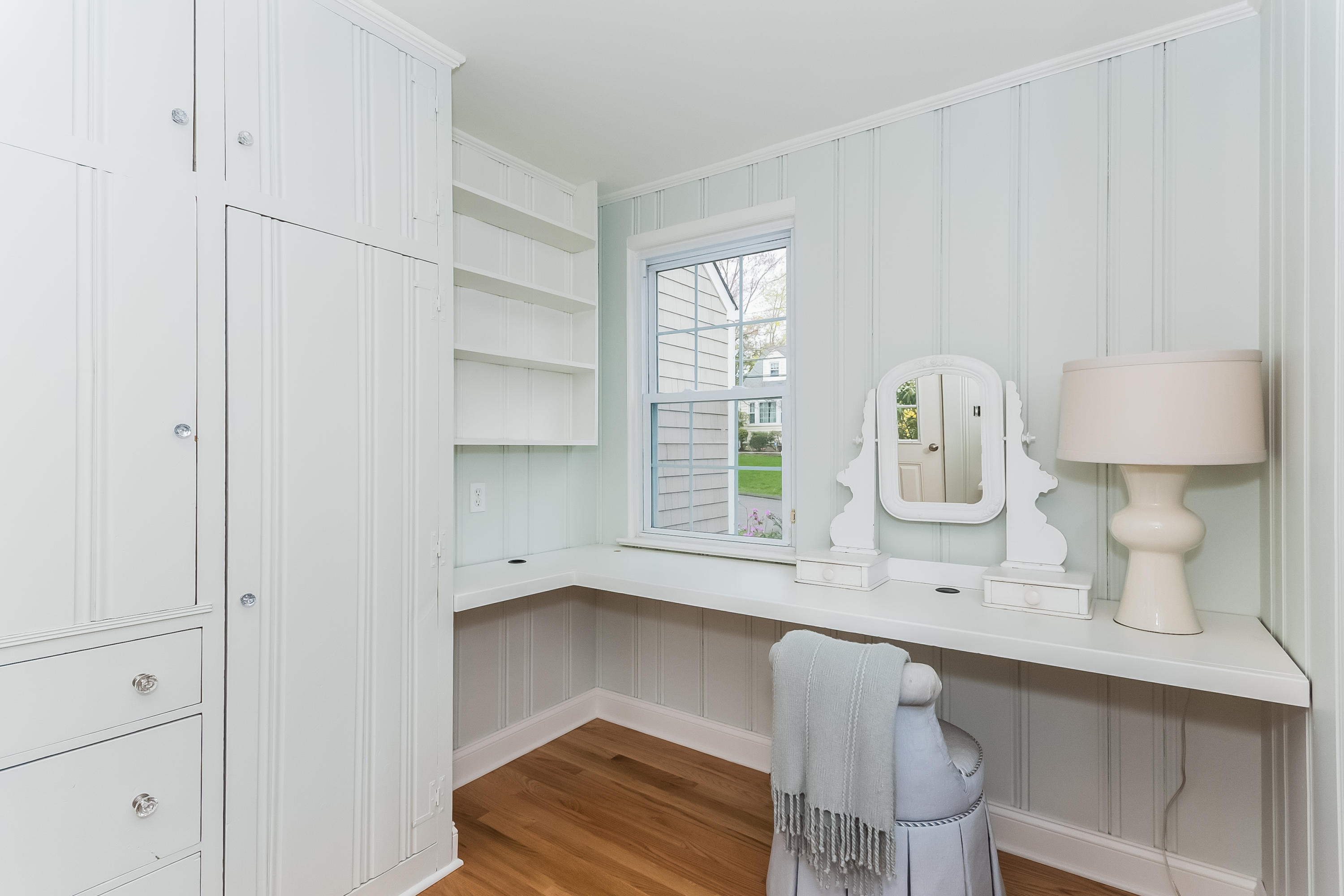 1 Walmsley Road Darien, CT 06820 - Photo 17 of 27 a room with a sink and a mirror