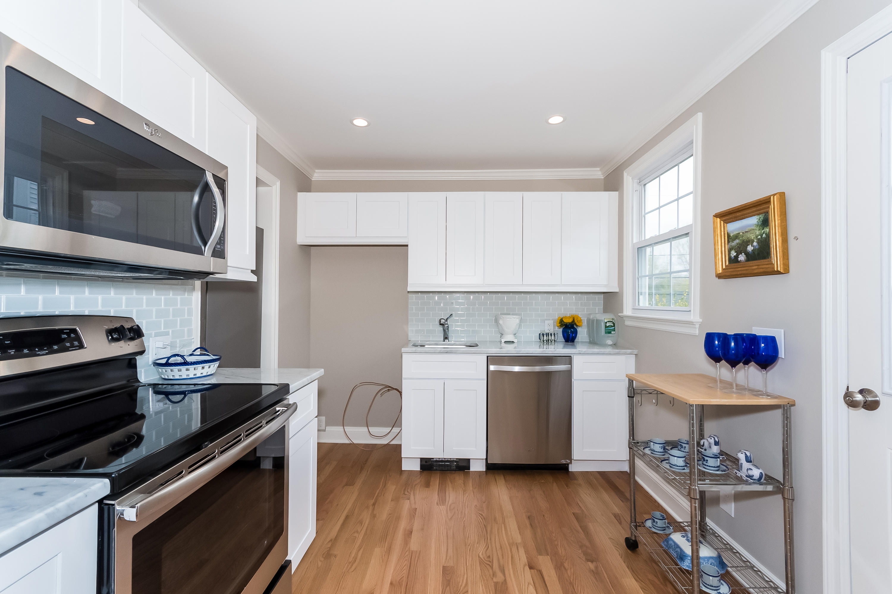 1 Walmsley Road Darien, CT 06820 - Photo 8 of 27 a kitchen with a stove and a microwave