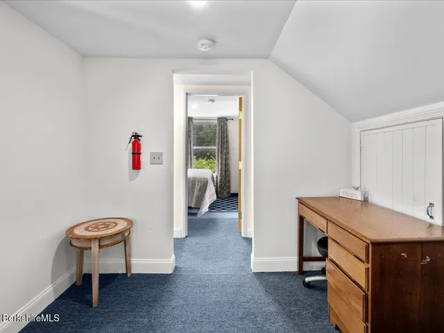 a room with a table and chairs