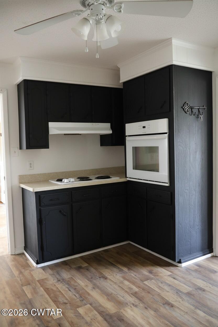 513 Viar Road Dyersburg, TN 38024 - Photo 10 of 37 a kitchen with stainless steel appliances granite countertop a refrigerator and a microwave