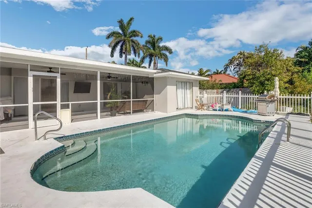 a view of a house with swimming pool