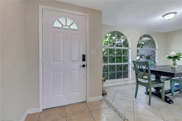 a view of a livingroom with furniture and window