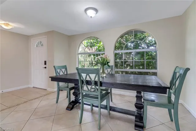 a workspace with furniture window and outside view