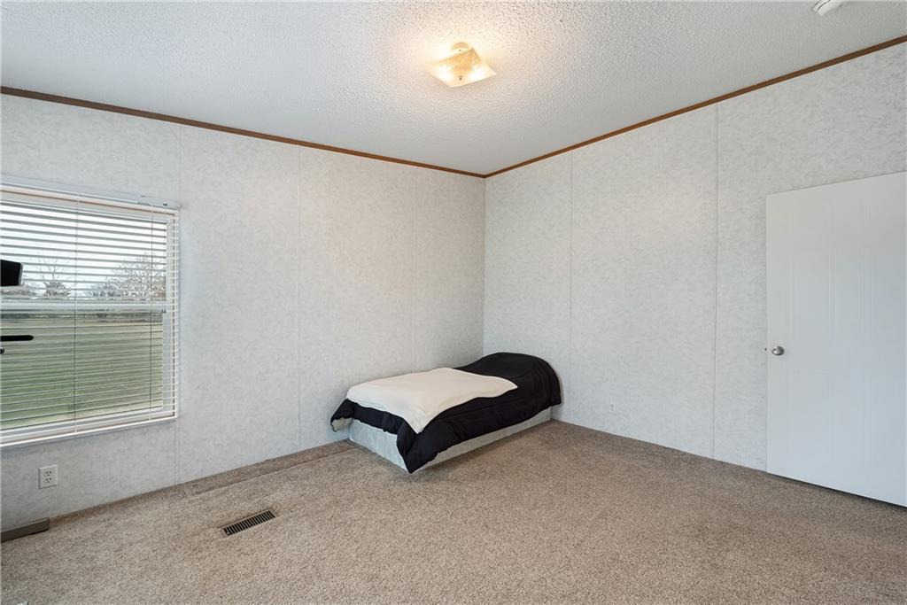 260 Lcr 751 Road Thornton, TX 76687 - Photo 28 of 40 a room with a bed and a window