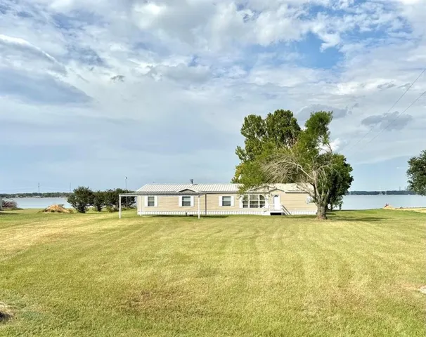 a view of a swimming pool and an outdoor space