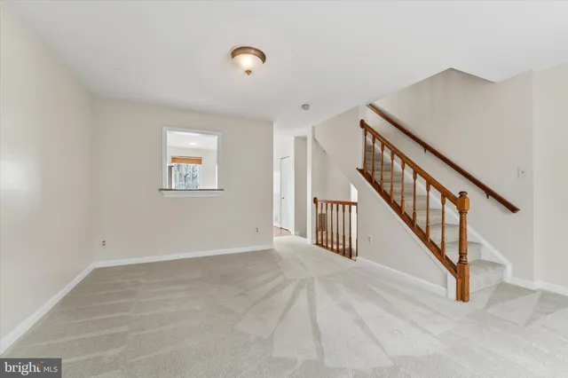 a view of an entryway with stairs