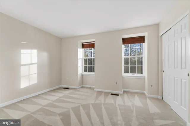 a view of a hallway with staircase