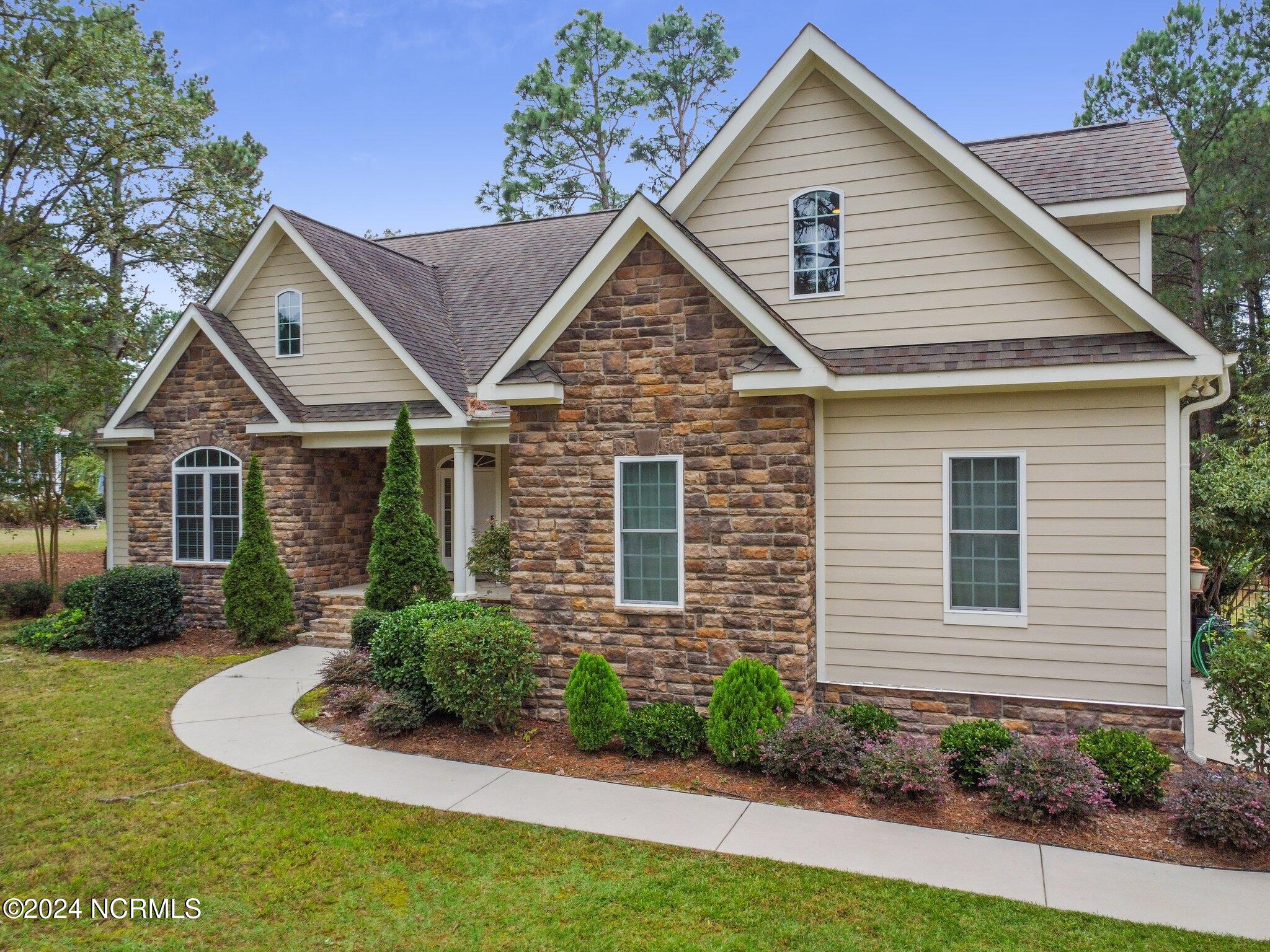 108 Hammerstone Circle Whispering Pines, NC 28327 - Photo 2 of 44 2