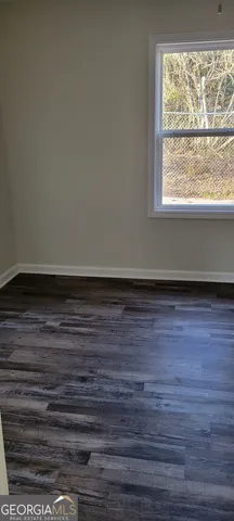 a view of a room with an empty space