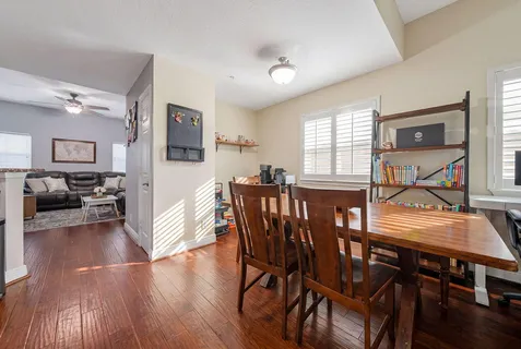 a living room with furniture and a rug