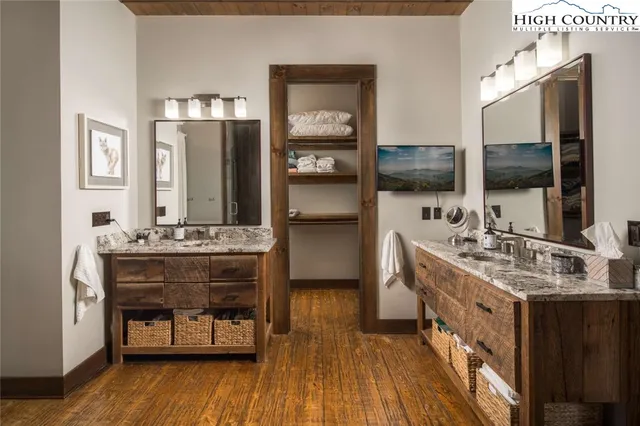 a kitchen with a sink and a stove top oven
