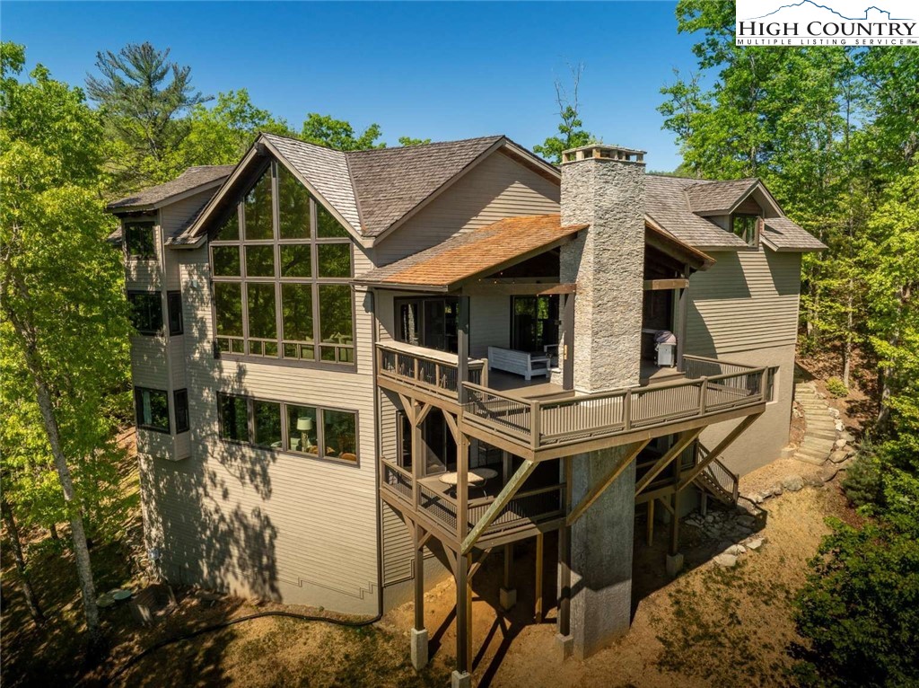 856 Ninebark Road Boone, NC 28607 - Photo 27 of 30 a view of a house with wooden deck front of house