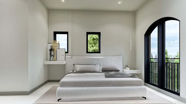a bedroom with bed and a window