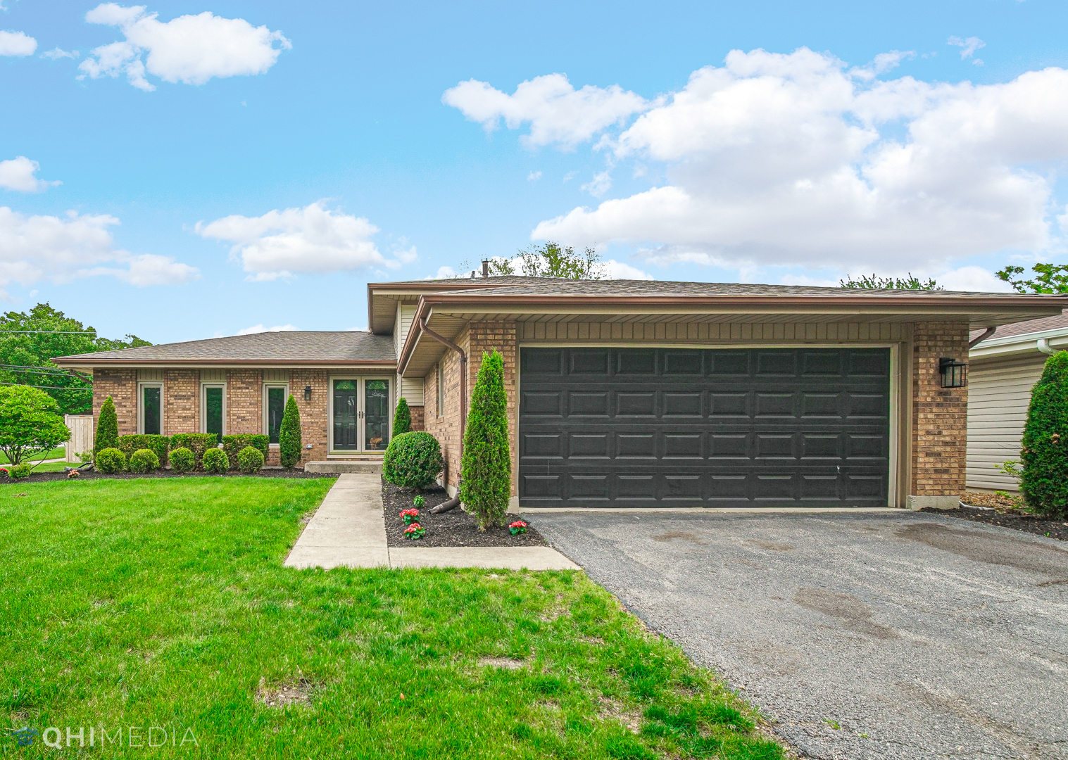6901 Creekside Road Downers Grove, IL 60516 - Photo 1 of 1 a front view of a house with a yard