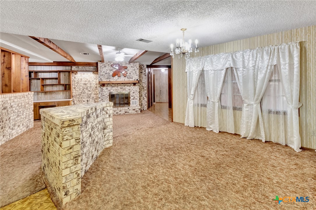 10957 Highway 77 Schulenburg, TX 78956 - Photo 2 of 35 wooden floor in an empty room