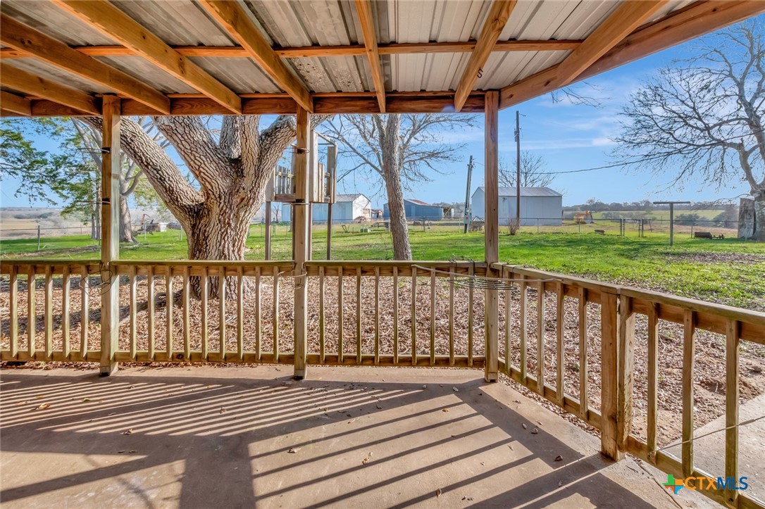 10957 Highway 77 Schulenburg, TX 78956 - Photo 25 of 35 a view of porch with a small yard