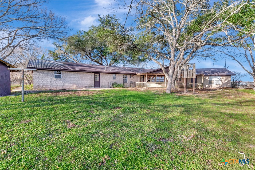 10957 Highway 77 Schulenburg, TX 78956 - Photo 30 of 35 a view of a house with a yard