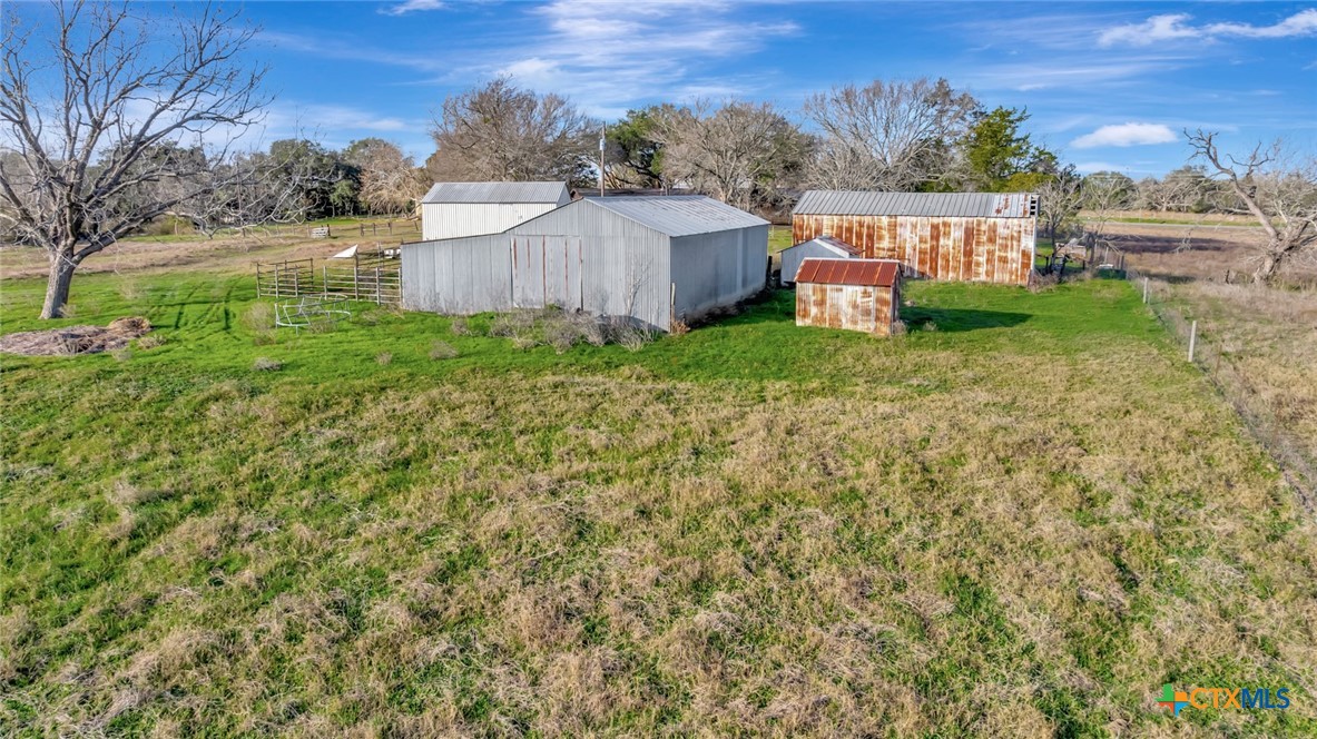 10957 Highway 77 Schulenburg, TX 78956 - Photo 32 of 35 a view of a house with a yard and table and chairs