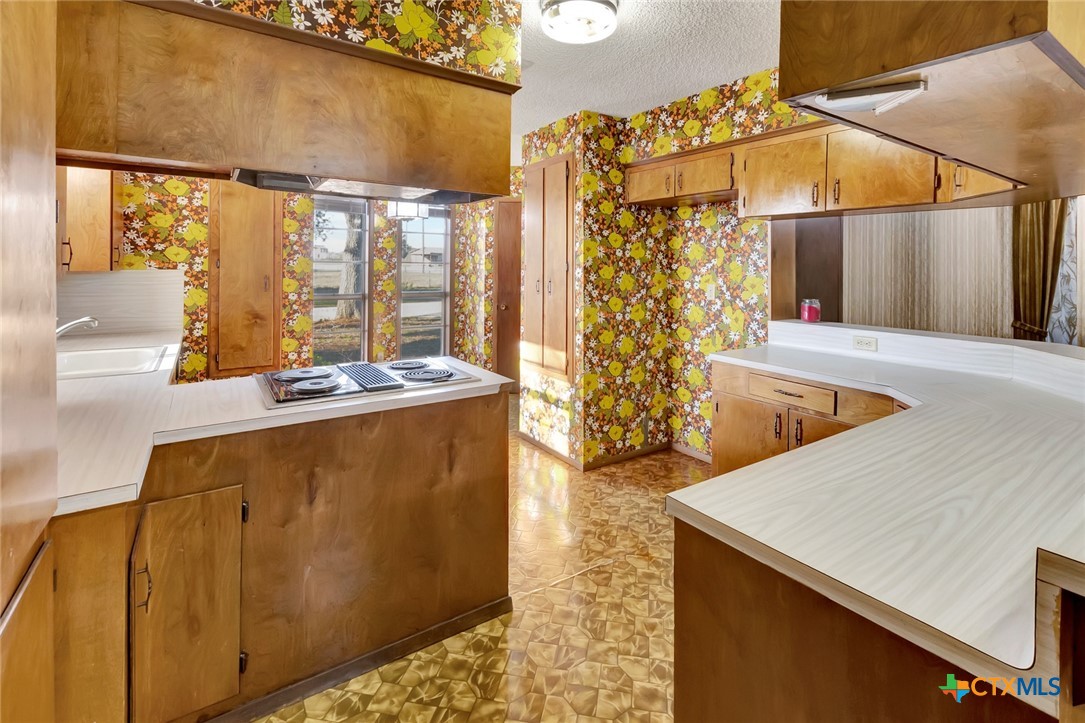 10957 Highway 77 Schulenburg, TX 78956 - Photo 5 of 35 a view of residential house with wooden floor