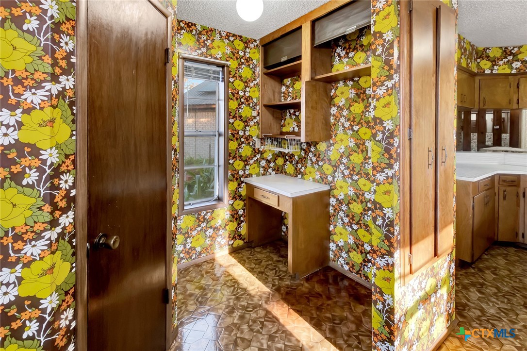 10957 Highway 77 Schulenburg, TX 78956 - Photo 9 of 35 a bathroom with a shower and a sink