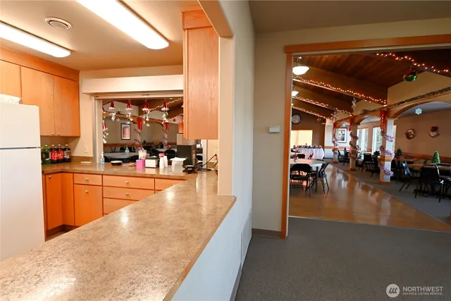 a lobby with furniture and a large window